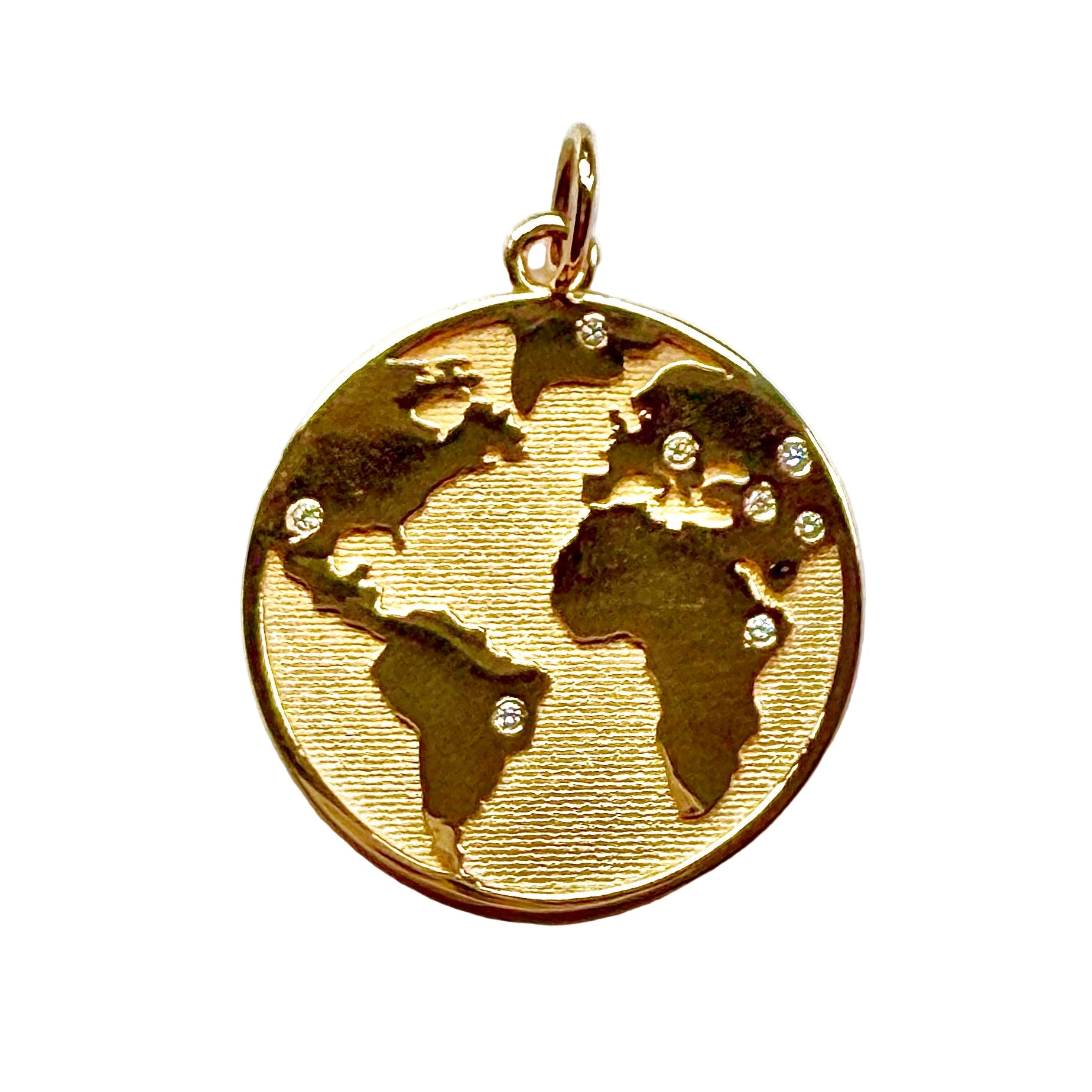 Gold pendant with world map design on a white background