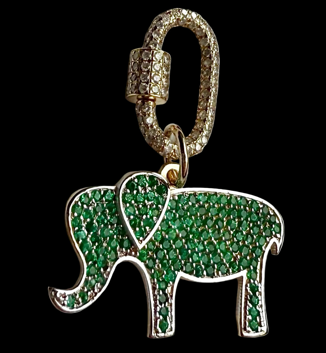 Green elephant pendant with gold accents on a black background