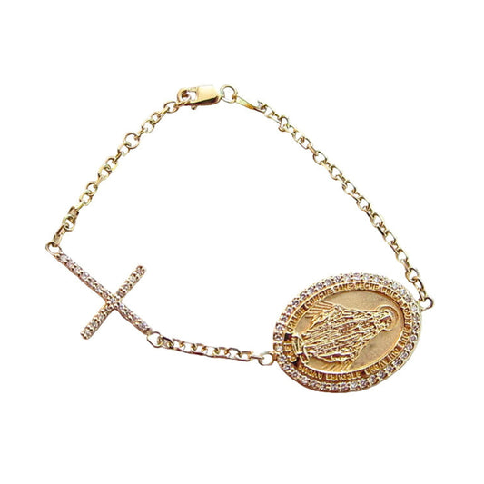 A gold-tone bracelet with a cross and round charm with Madonna figure.