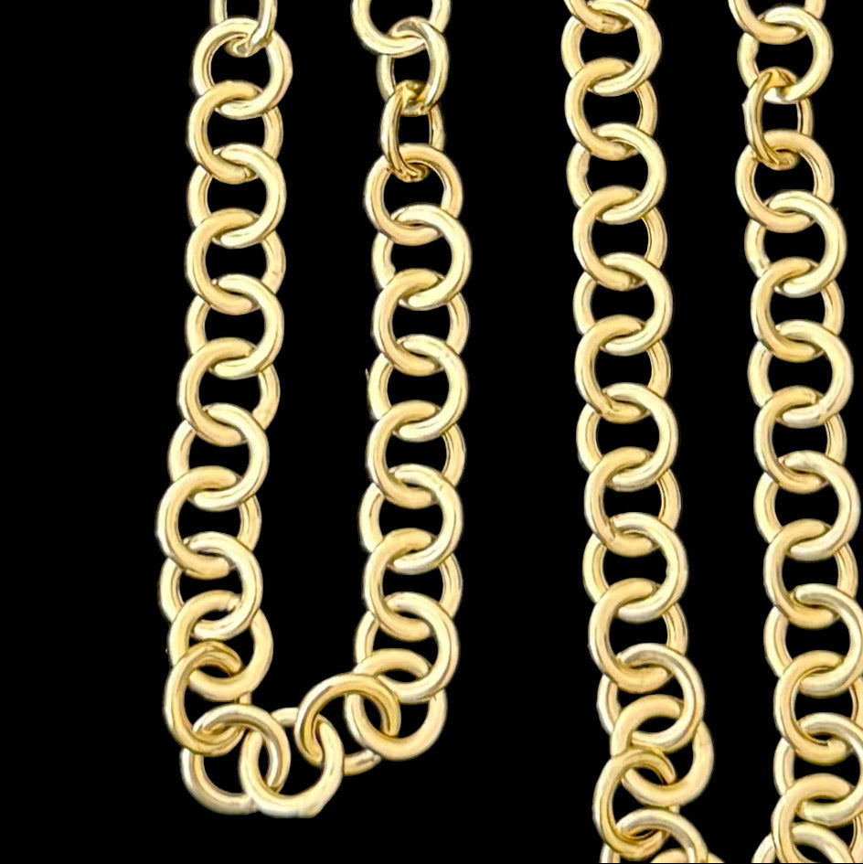 Gold chain on a white background