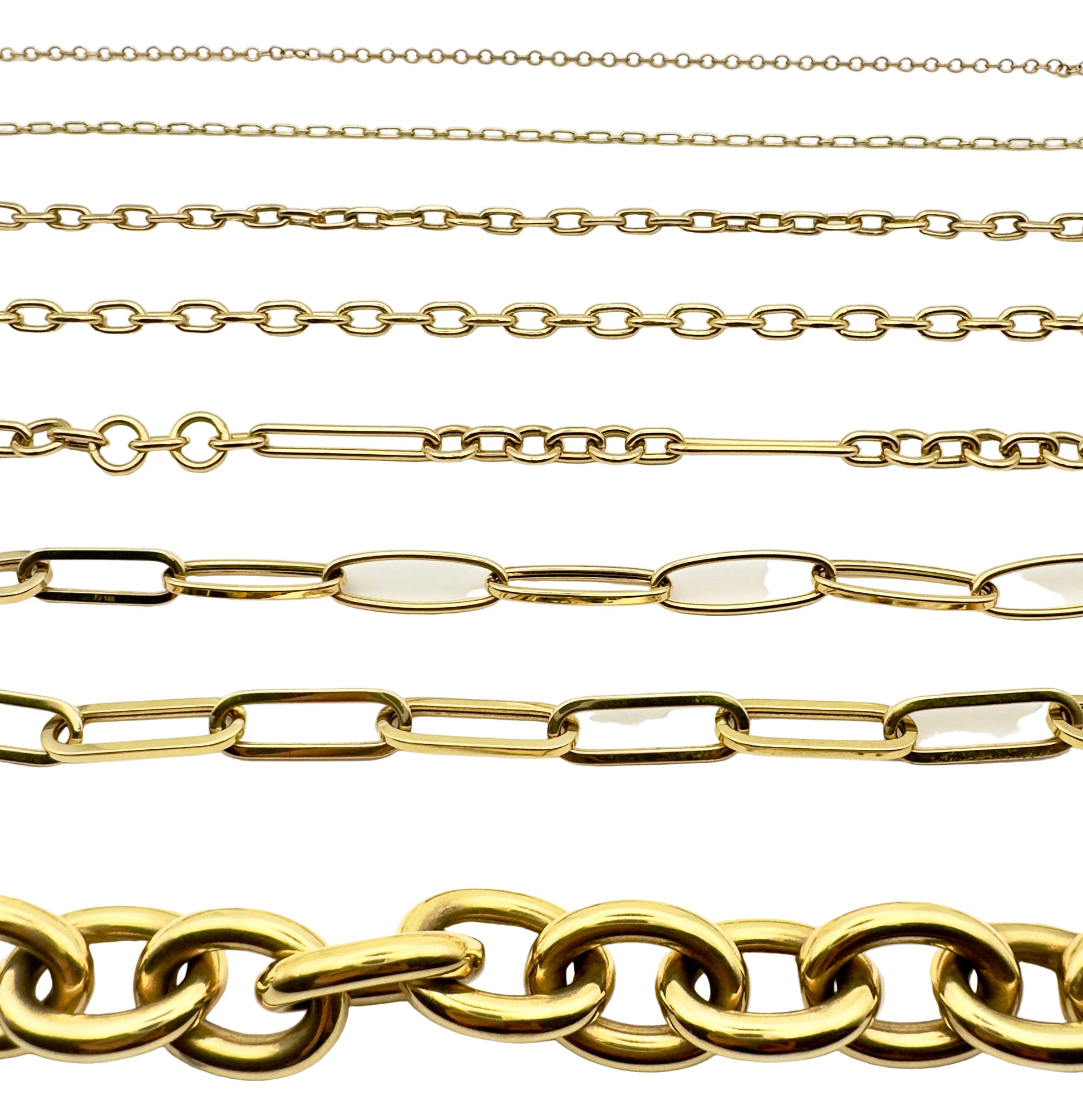 Collection of gold chains on a white background