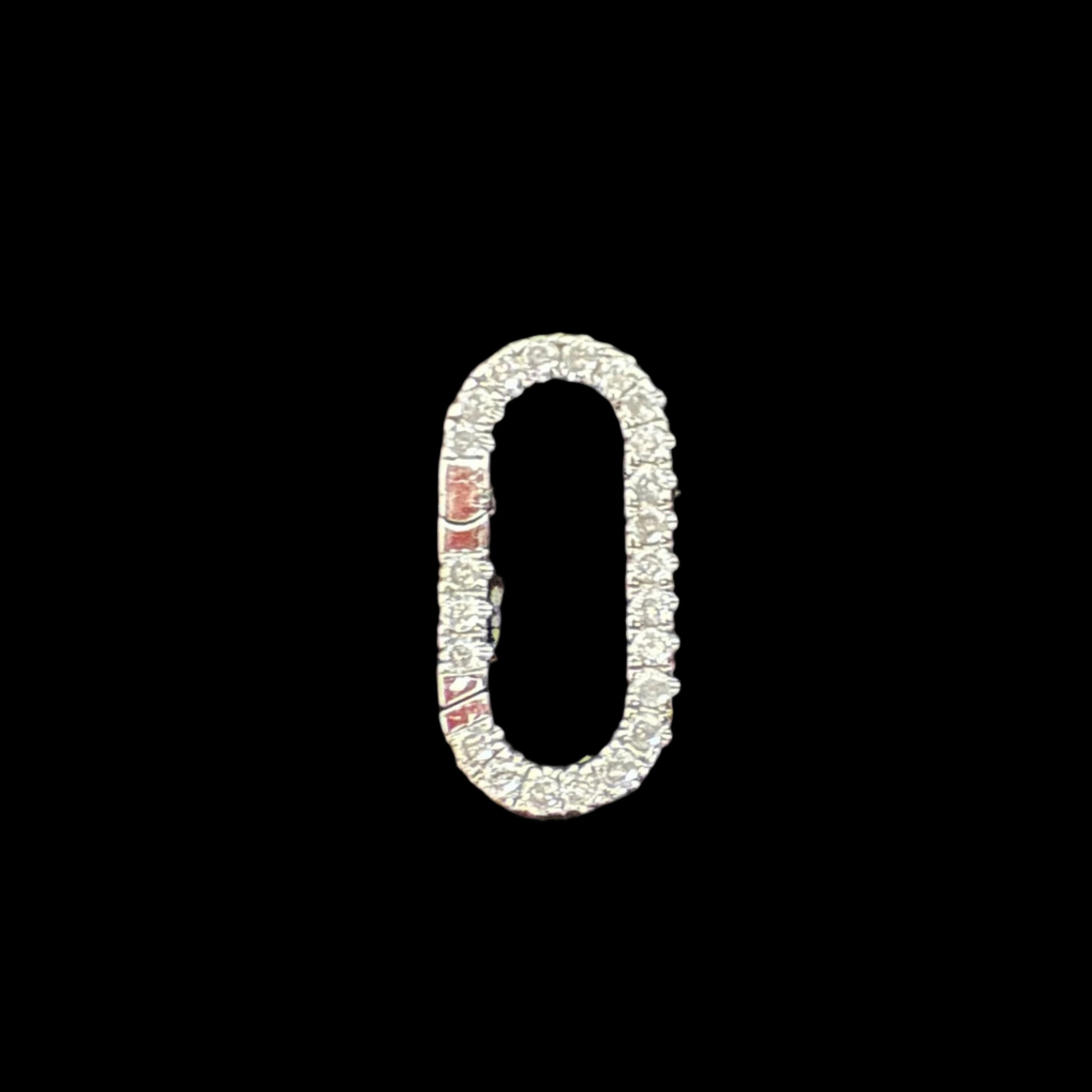 Diamond-studded loop clip charm on a black background