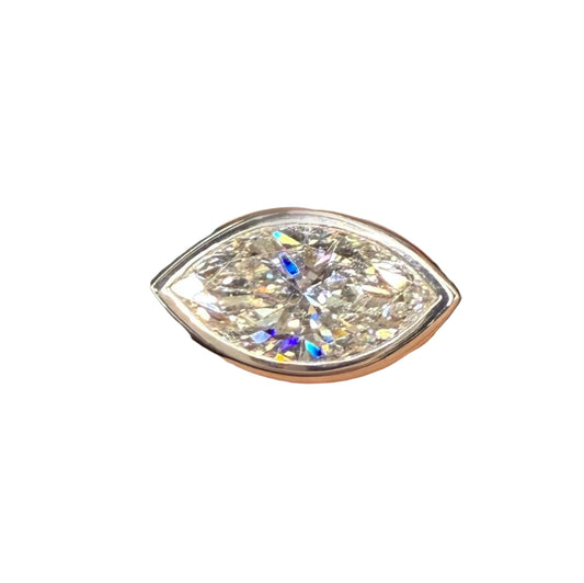 Pointed oval shaped diamond on white background.