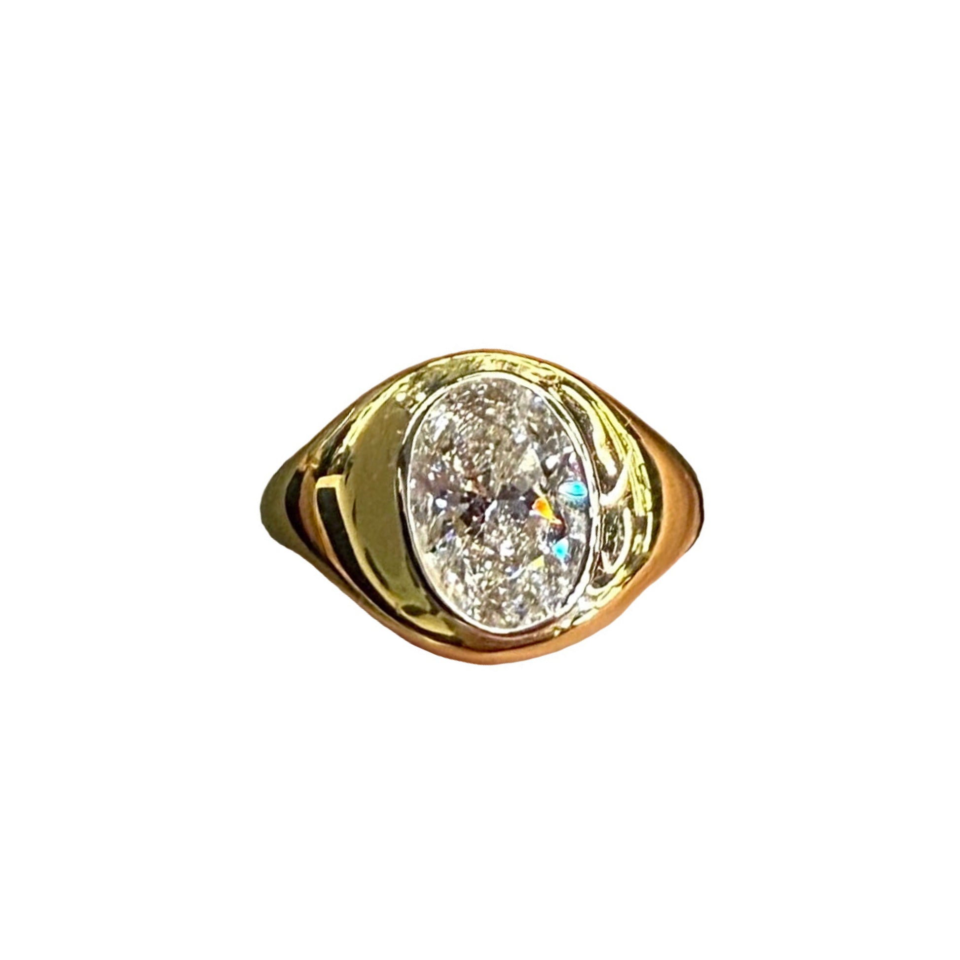 Gold ring with a large diamond on a white background