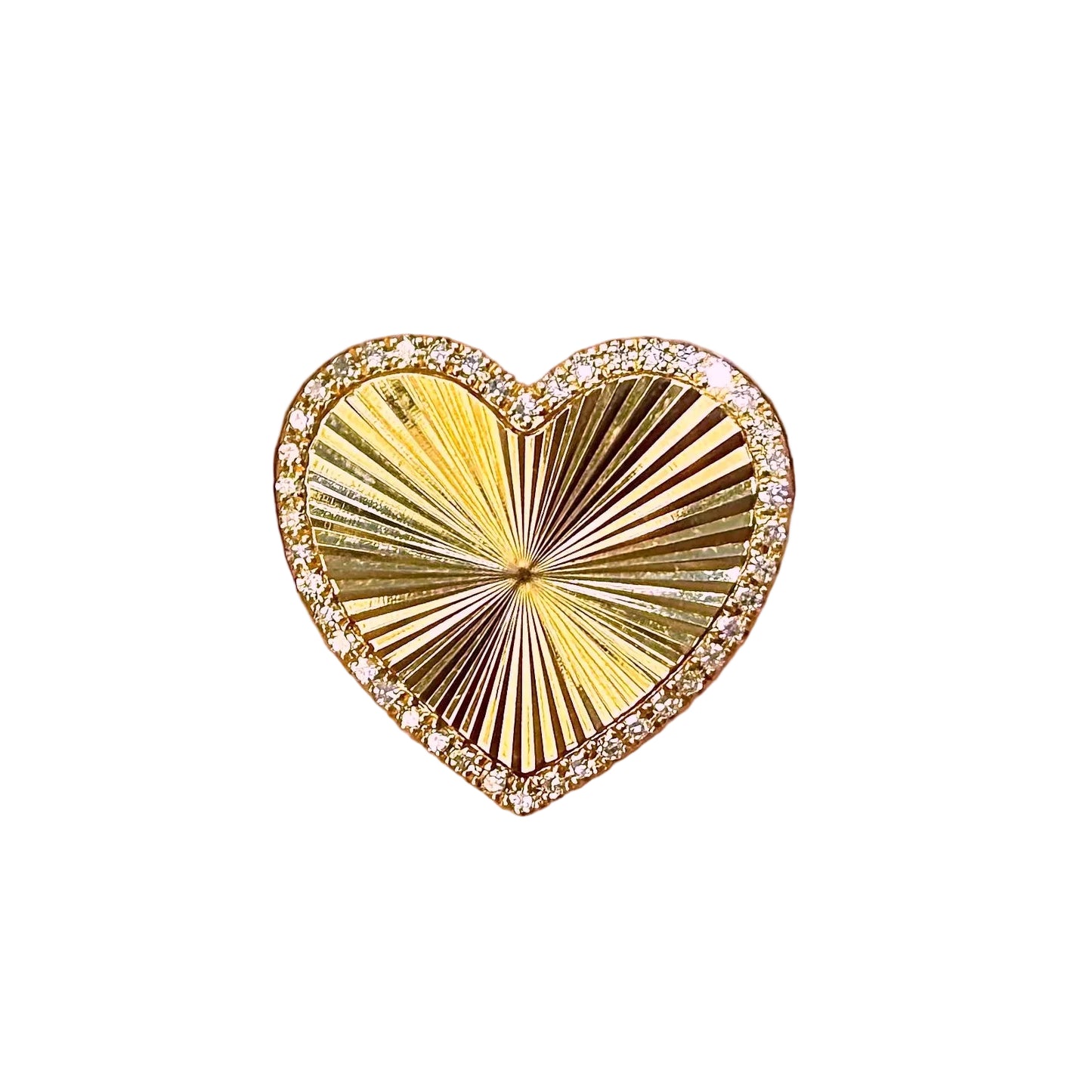 Gold heart-shaped earring with sunburst design on a white background.