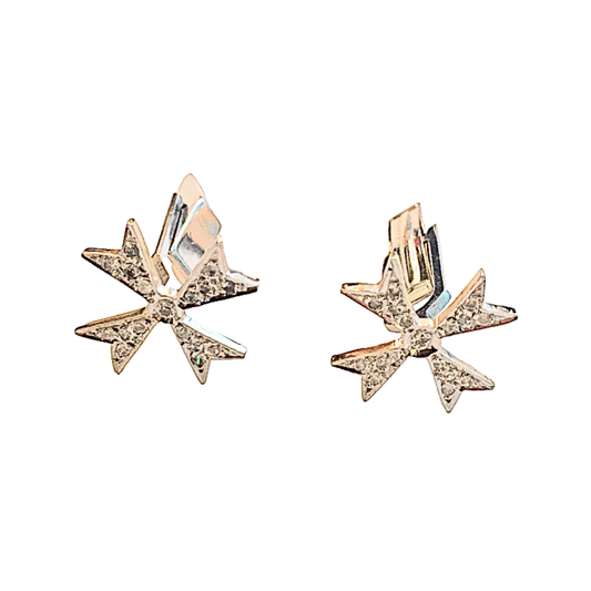 Pair of star-shaped earrings on a white background