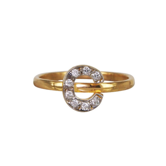 A 14k yellow gold ring with a letter-shaped design, adorned with pave diamonds.