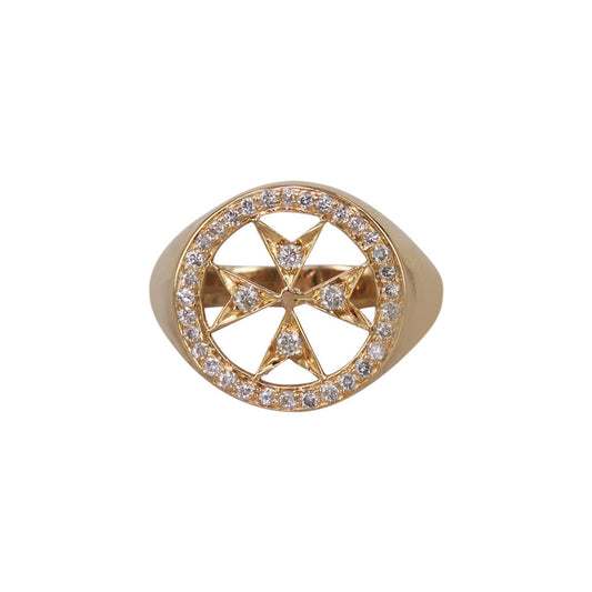 A 14k yellow gold pinky ring with a pave diamond Maltese emblem in the center.